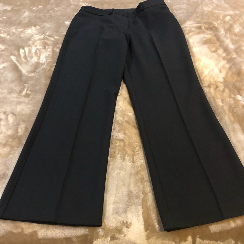 Pants black  2 front pockets  zips up with 2 clips
